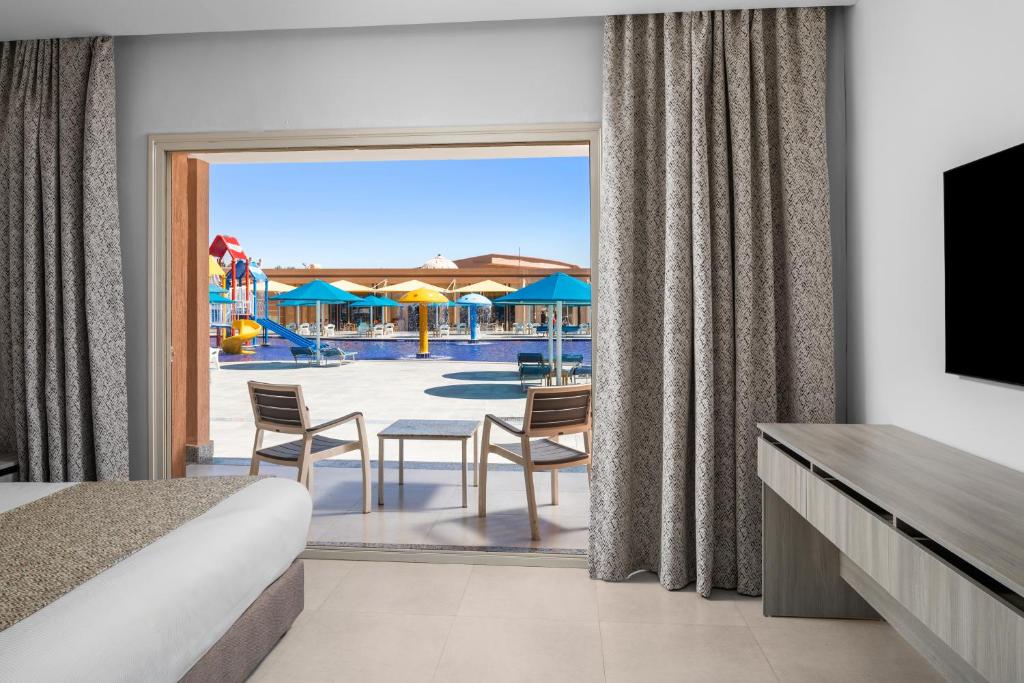 Pickalbatros Jungle Aqua Park Resort Neverland Hurghada — kamer 1